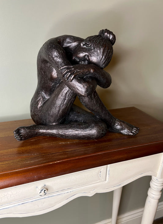 Lonely Sitting Lady